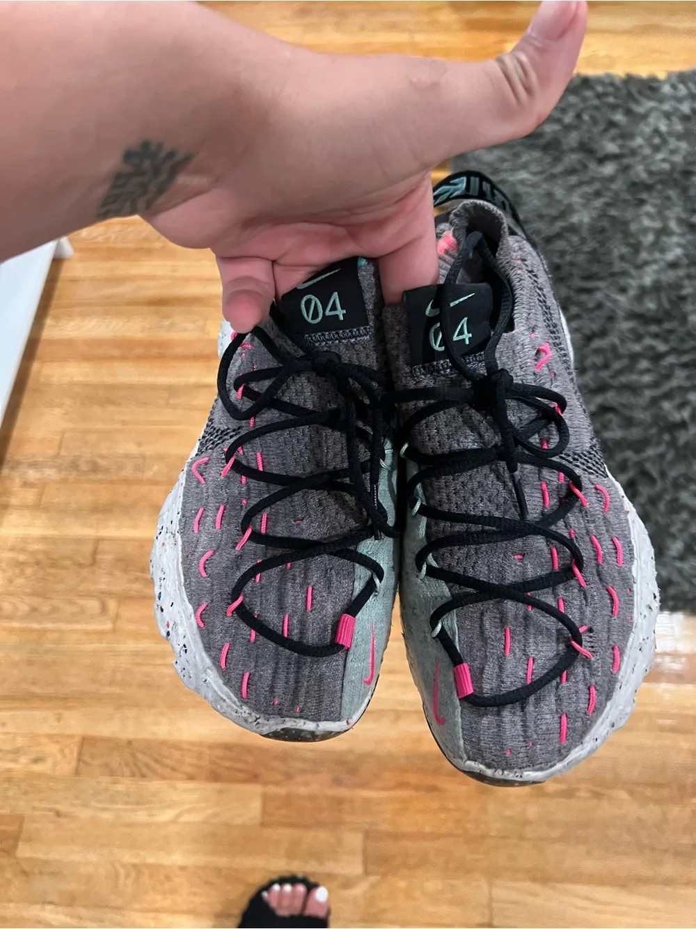 Nike Women's Gray Knit Sneakers with Pink Highlights